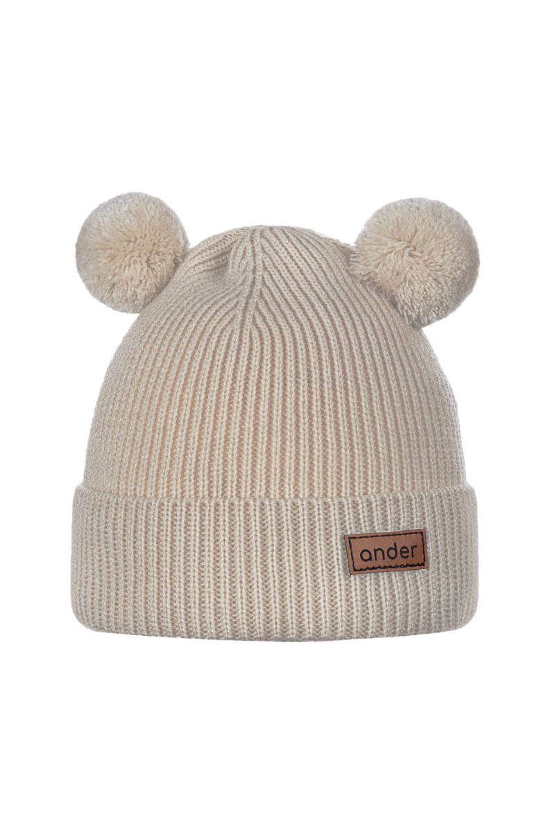 Czapka merino TEDDY o dziecięcym, uroczym wyglądzie.
Czapka dziecięca z grubym prążkowanym splotem.