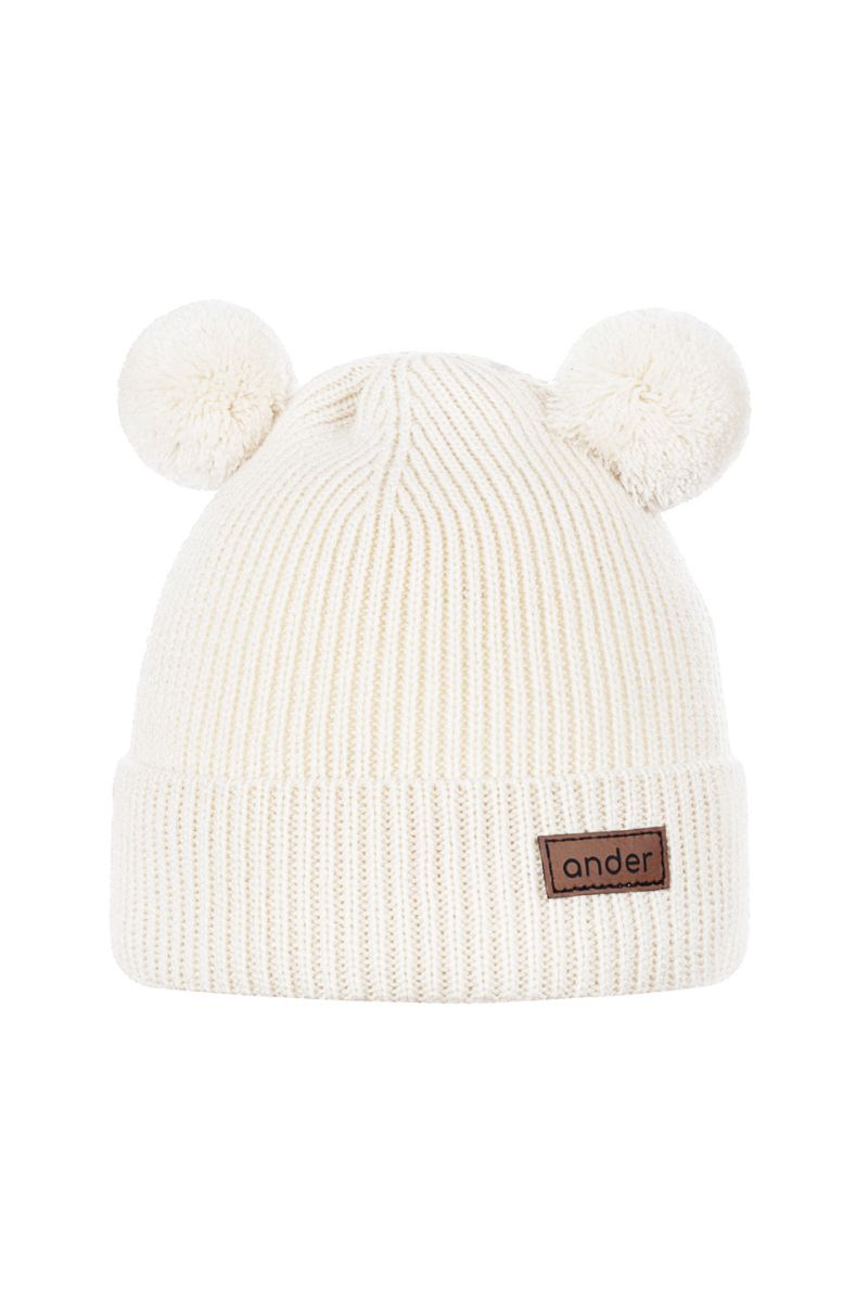 Dziecięca czapka beanie z wywinięciem i uszkami misia.
Czapka merino TEDDY w kolorze ecru 