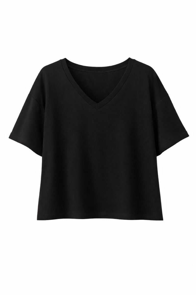 Naturalna odzież damska wykonana z wełny merino.
Czarny T-shirt merino do garderoby kapsułowej.